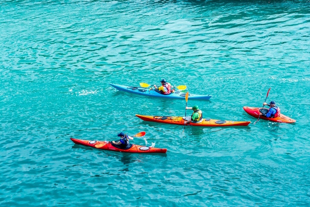 A group of kayakers paddling in the Florida Keys
